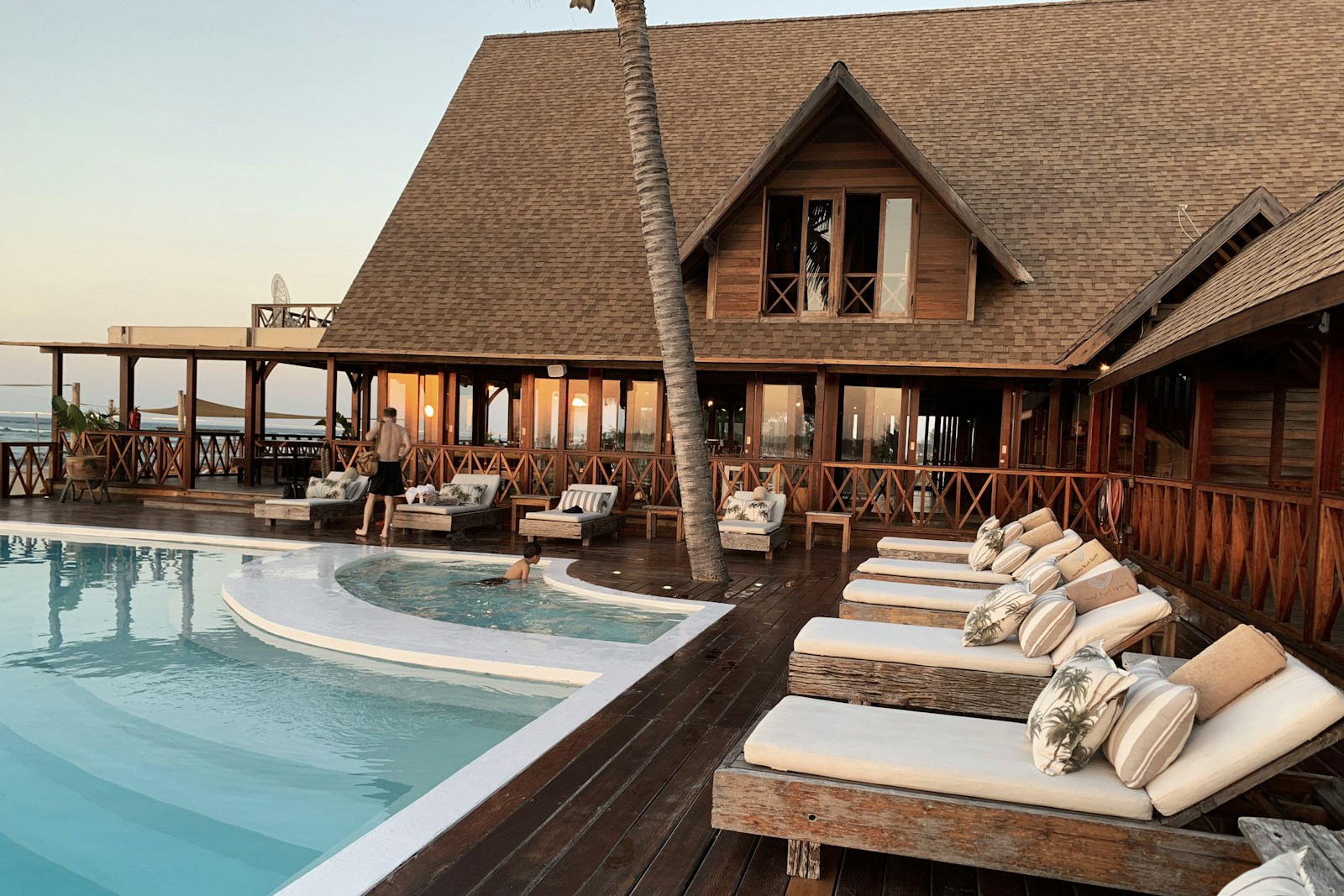 Terraced hotel overlooking a calm coast